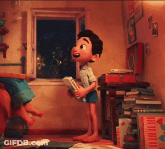 Luca Paguro Happily Holding A Book GIF