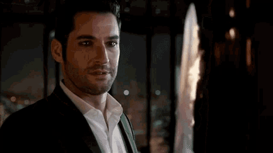 Lucifer Tom Ellis Teary Eyes Sword Flame GIF