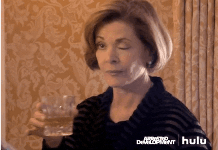 Lucille Bluth Drinking Alcohol One Eye Fixed Close GIF