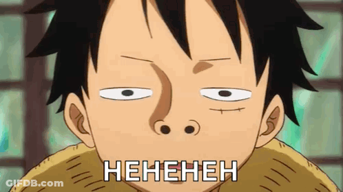 Luffy From One Piece Is Making A Funny Face With His Eyes Closed And The Words Henehene Written On His Face . GIF