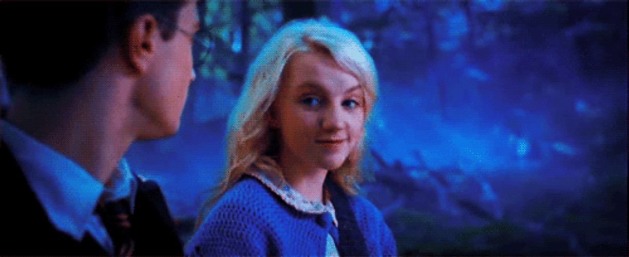 Luna Lovegood Looks Pleased With Harry Potter GIF