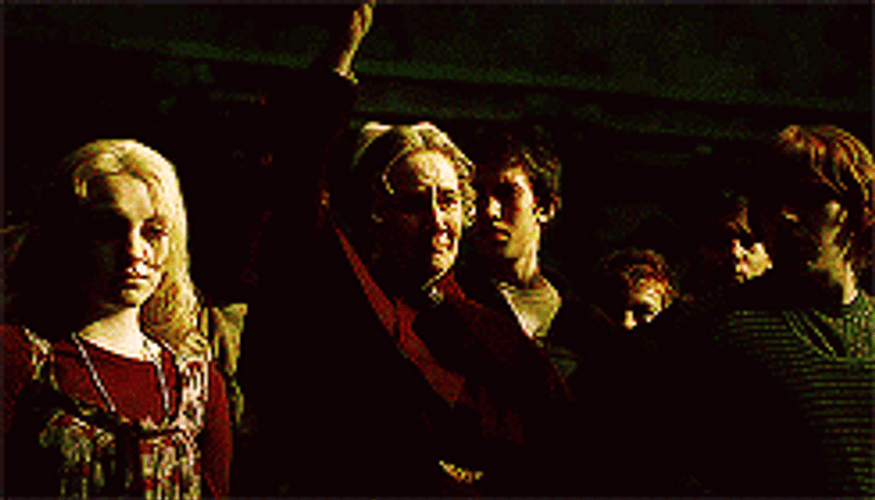 Luna Lovegood Raising Her Wand To Fight GIF
