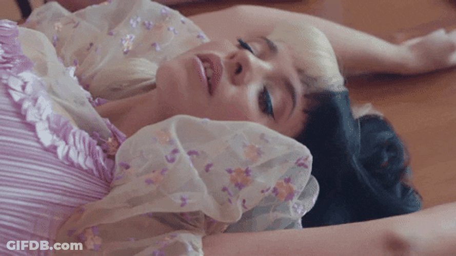 Lying Melanie Martinez Smile GIF
