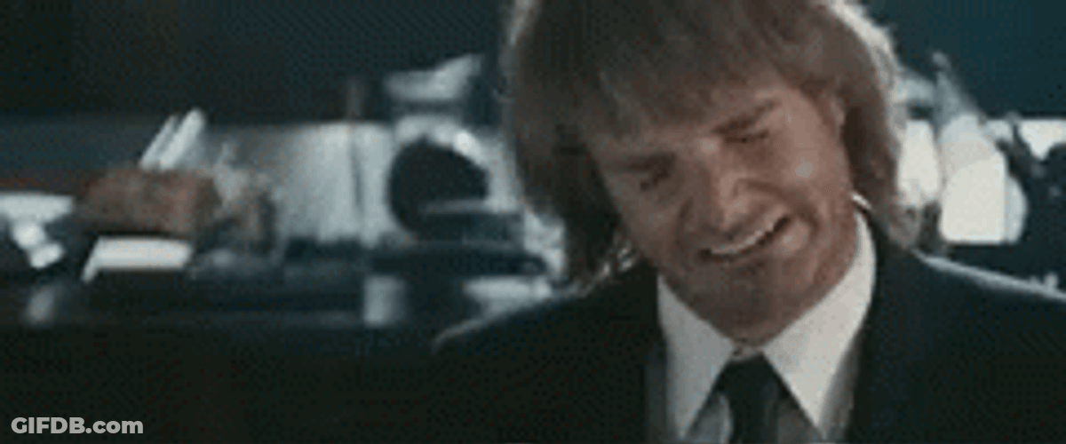 Macgruber Laughing While Closing Eyes GIF