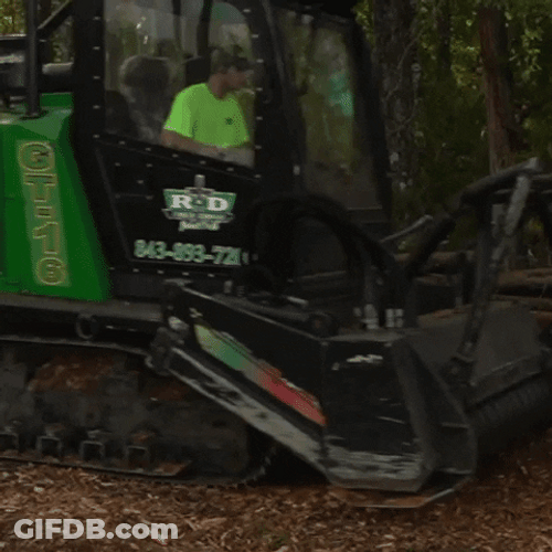 Machine Running Backward While Making Mulch GIF