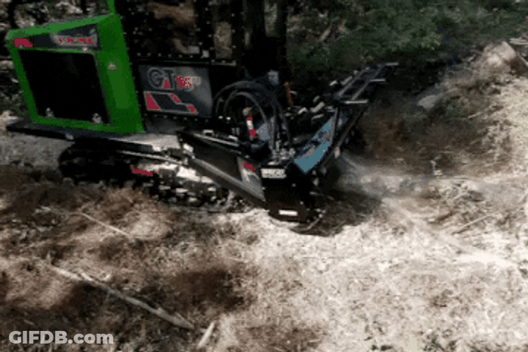 Machine Steadily Producing Mulch GIF