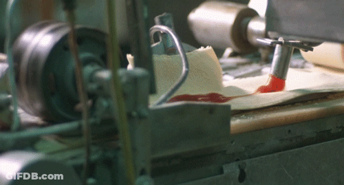 Machine With Label Saying A GIF