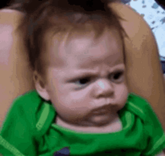 Mad Facial Reaction Of Baby GIF