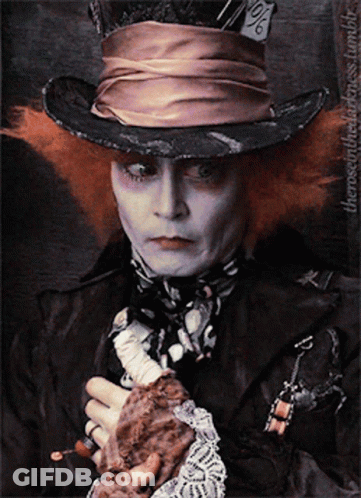 Mad Hatter Holding Glove GIF