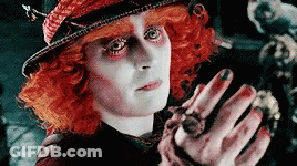 Mad Hatter Holding Spider GIF