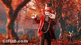 Mad Hatter Holding Teapot In Forest GIF