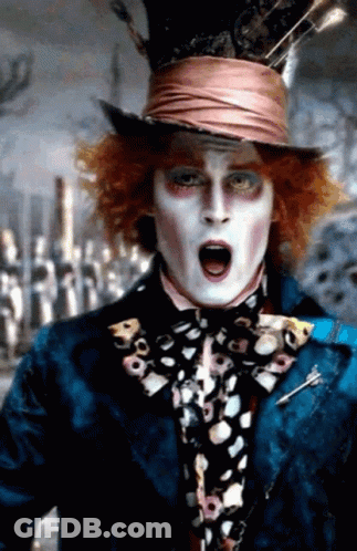 Mad Hatter In Blue Jacket And Top Hat GIF