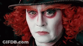 Mad Hatter In Hat And Red Wig GIF