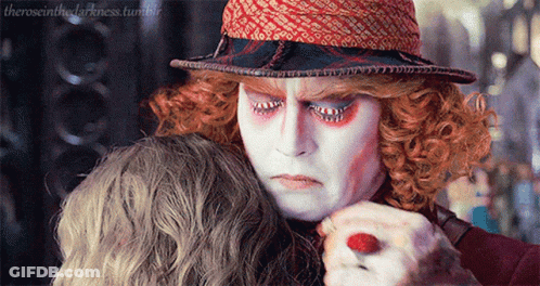 Mad Hatter In Pink Hat And Bow Tie GIF