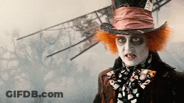 Mad Hatter In Top Hat And Scarf GIF