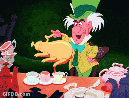 Mad Hatter Pouring Tea Into Cup GIF