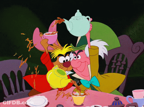 Mad Hatter Pouring Tea Into Rabbit Cup GIF