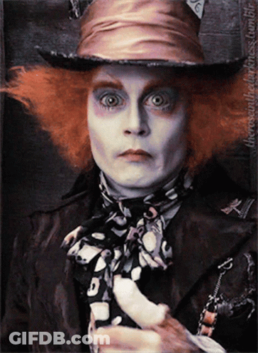 Mad Hatter Wearing Scarf GIF