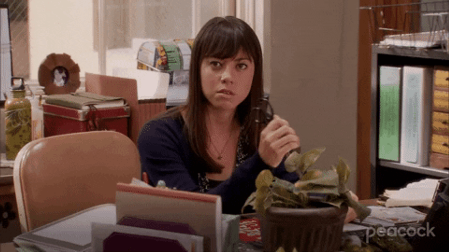 Mad Lady About To Stab With Scissors GIF