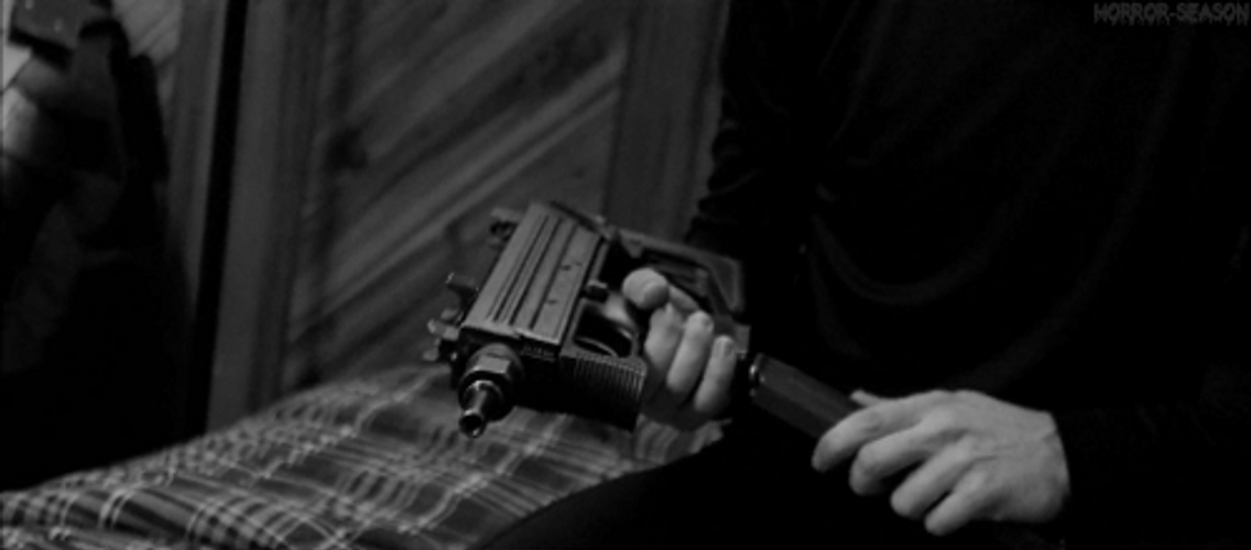 Mafia Guy Reloading His Weapon GIF
