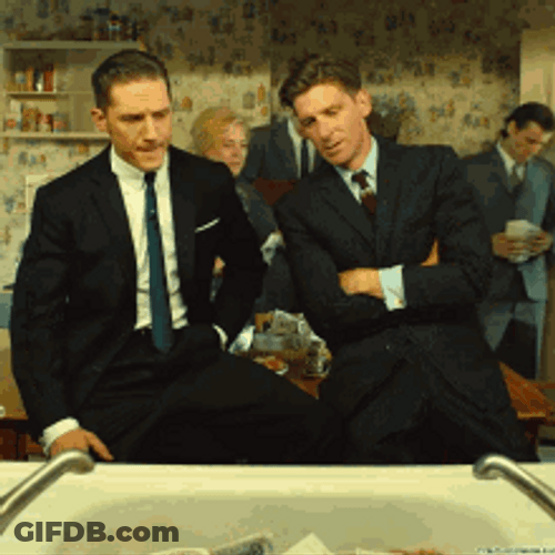 Mafia Putting Money Bags On Sink GIF