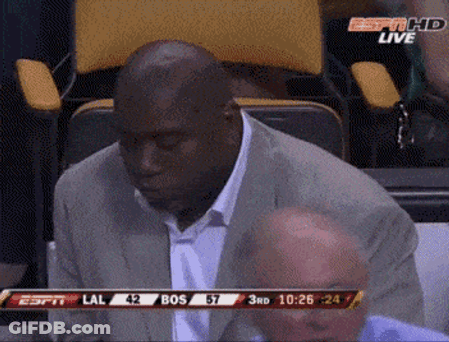 Magic Johnson Shoving Popcorn In Mouth Meme GIF