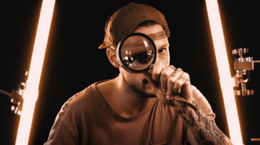 Magnifying Glass Tattooed Curious Guy Inspecting GIF