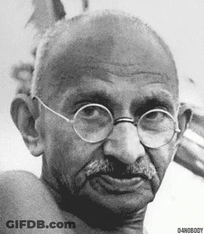 Mahatma Gandhi In Glasses Talking To Woman In Garden GIF