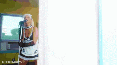 Maid Singing Into Microphone GIF