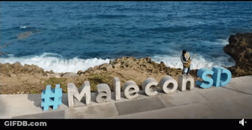 Malecon Sign On Road GIF