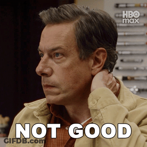 Man Adjusting Ear With HBO Max Logo GIF