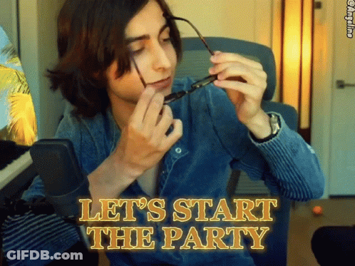 Man Adjusting Glasses At Microphone Saying Let's Start Party GIF