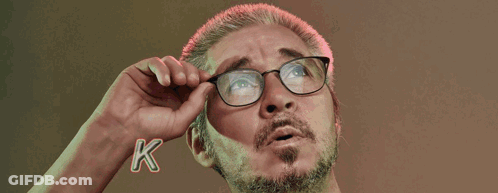 Man Adjusting Glasses In Front Of Ko GIF