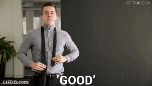 Man Adjusting Tie Saying Good GIF