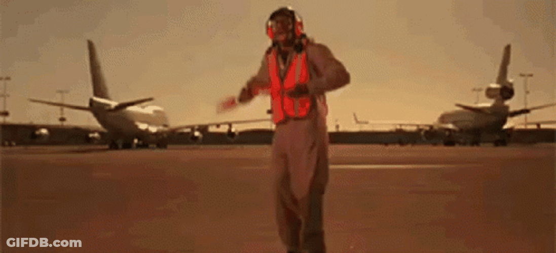 Man Airport Marshal Dancing In Runway GIF