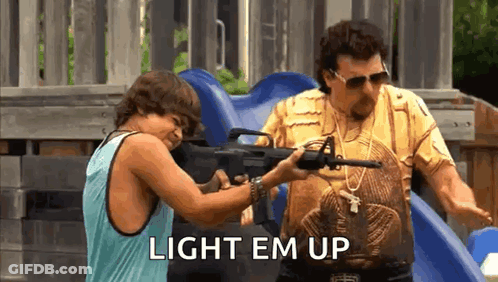 Man And Boy Holding Guns At Playground GIF