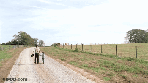 Man And Boy Holding Hands GIF