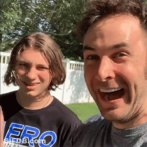 Man And Boy Posing In Aero Shirt GIF