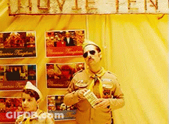 Man And Boy Scout By Movie Tent Sign GIF