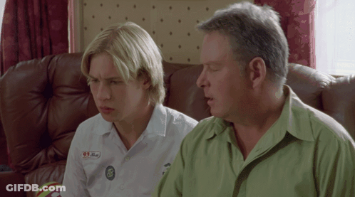 Man And Boy Sitting On Couch With 91 Button GIF