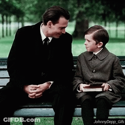 Man And Boy Talking On Bench GIF