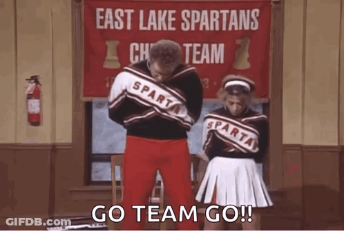 Man And Cheerleaders East Lake Spartans GIF