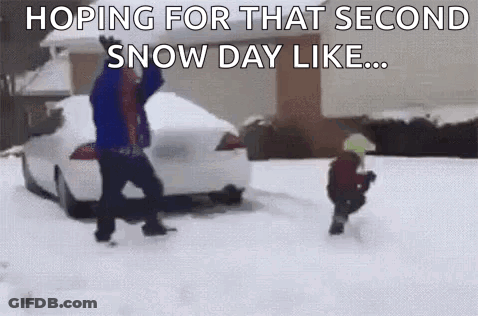 Man And Child Playing In Snow GIF