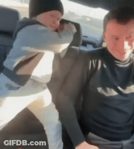 Man And Child Sitting In Car GIF