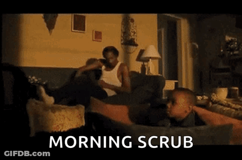 Man And Child Sitting On Couch Saying Morning Scrub GIF