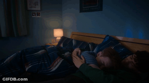 Man And Child Sleeping On Bed GIF