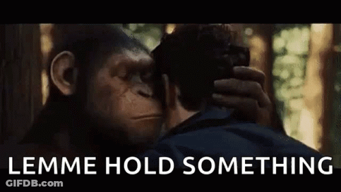 Man And Chimpanzee Looking At Each Other Saying Lemme Hold Something GIF