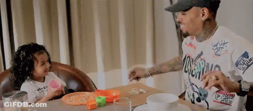 Man And Girl Eating Pizza And Playing With Toys GIF