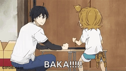 Man And Girl Sitting At Table With Box GIF
