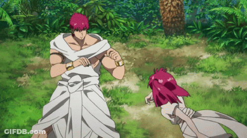 Man And Girl With Pink Hair Standing In Field GIF